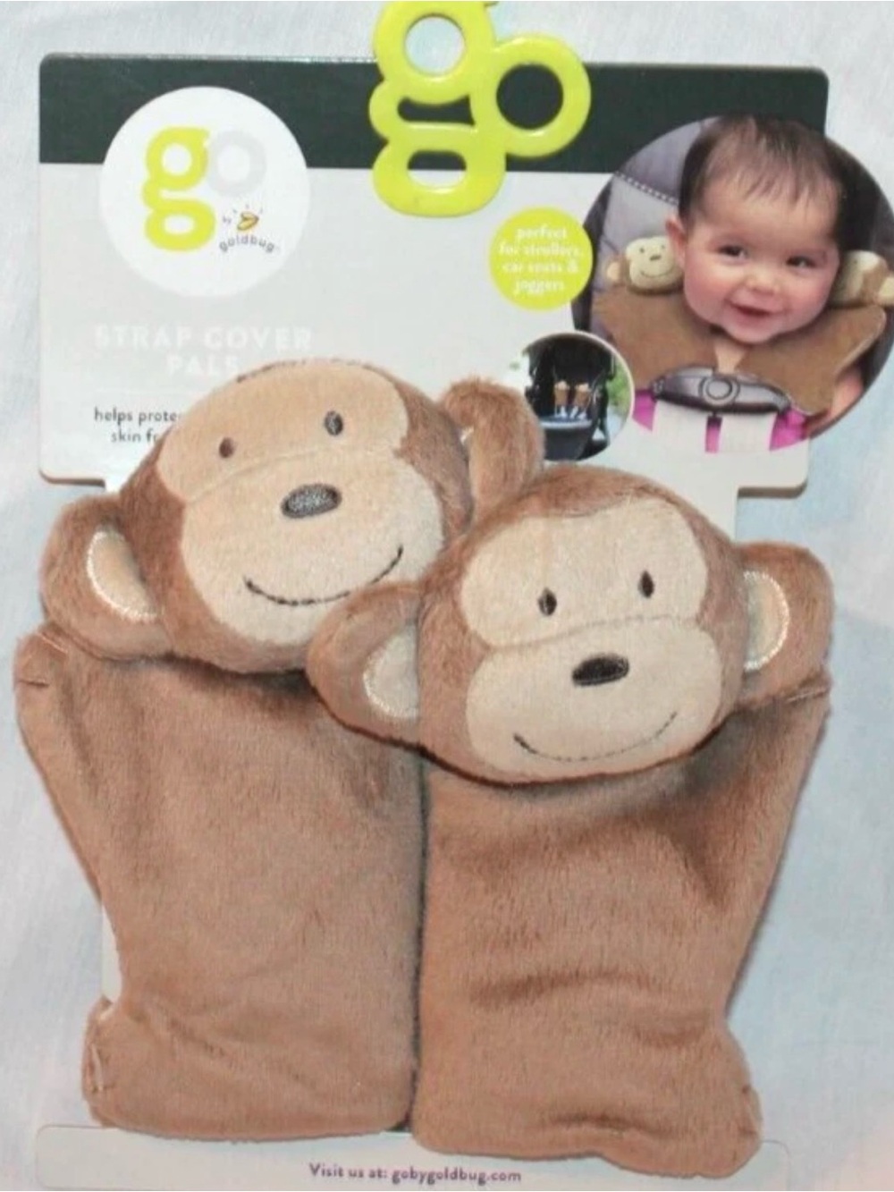 Plush monkey car seat strap covers